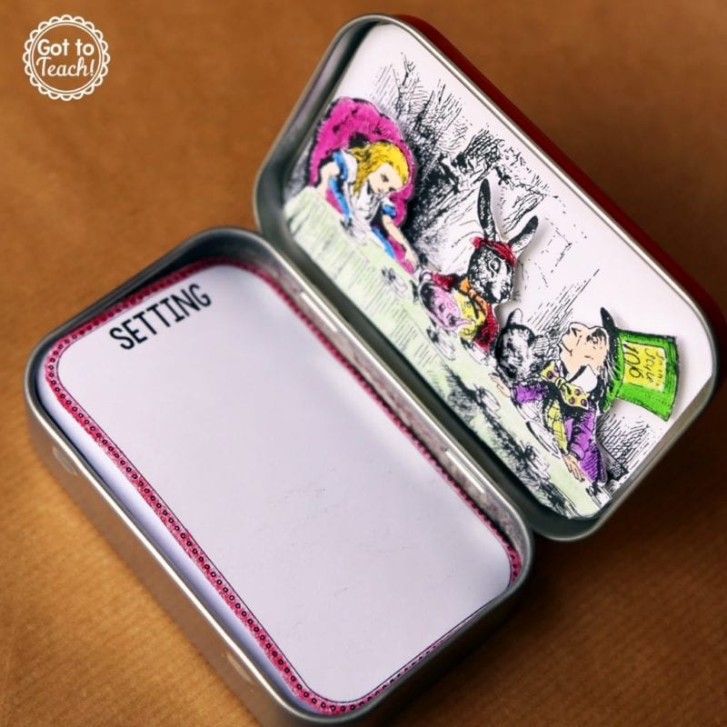 a mint tin in an illustration from Alice in Wonderland on the inside of the top and labelled notecards internal